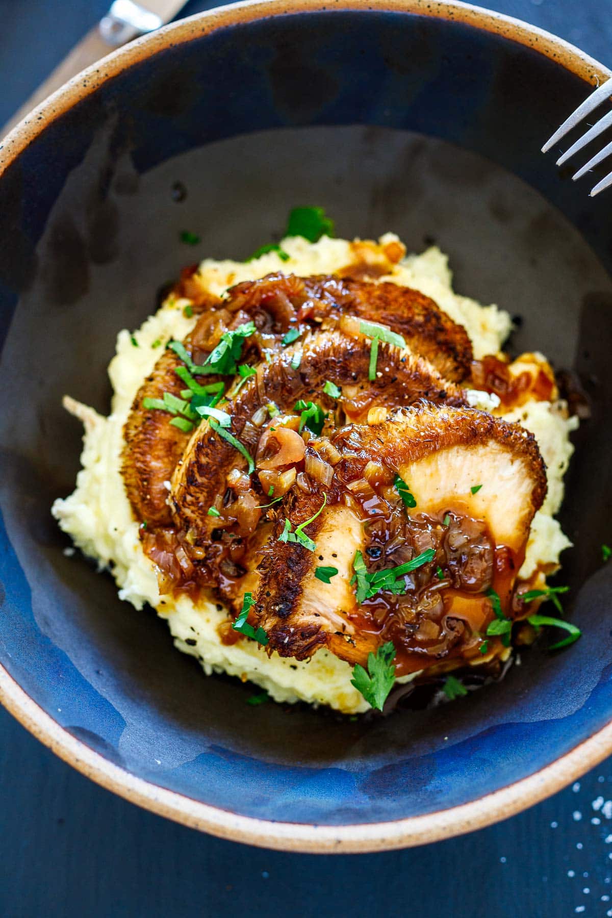 lion's mane slices over mashed potatoes with pan sauce!